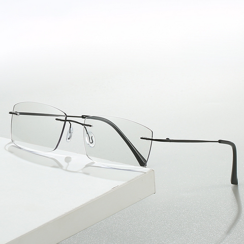 2024 New retro metal rimless anti-blue light color-changing glasses